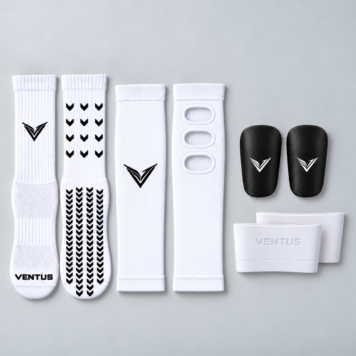 Baller Bundle with White Aero Pro-Cut Sleeves, Pro-Grip Socks, Stealth Guards and SockLock, flat lay