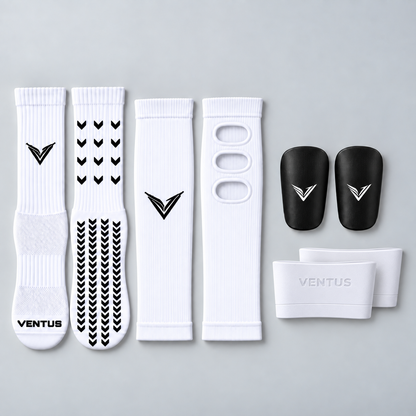 Baller Bundle with White Aero Pro-Cut Sleeves, Pro-Grip Socks, Stealth Guards and SockLock, flat lay
