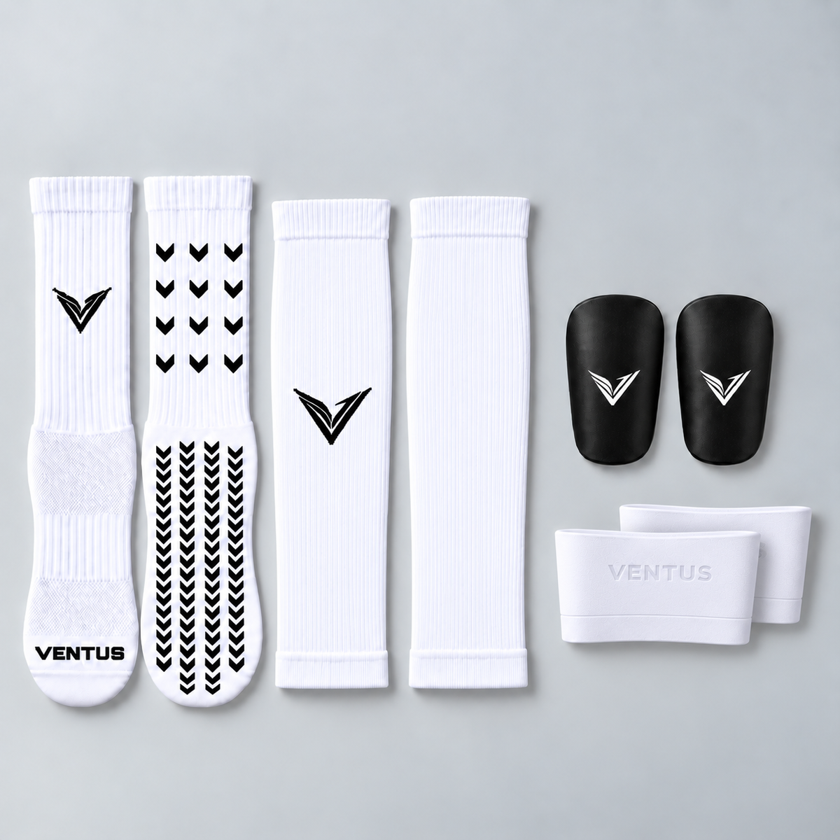 Baller Bundle with White Core Pro-Cut Sleeves, Pro-Grip Socks, Stealth Guards and SockLock, flat lay