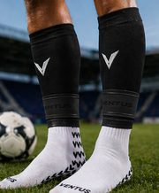 Black Core Pro-Cut Sleeves, Pro-Grip Socks and SockLock worn on the pitch