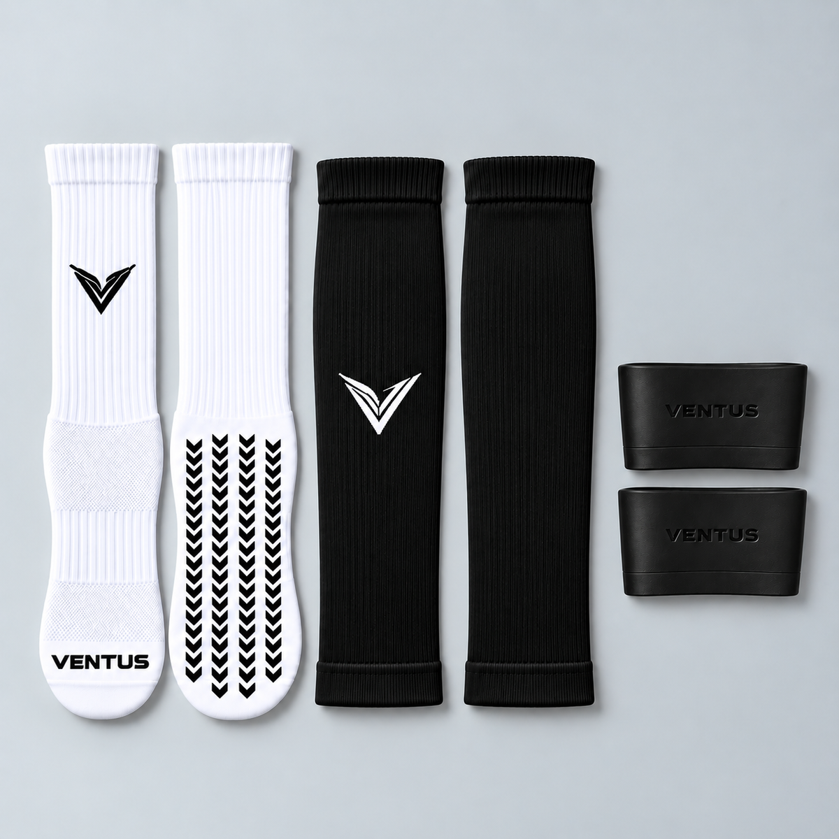 Match Bundle with Black Core Pro-Cut Sleeves, Pro-Grip Socks and SockLock, flat lay