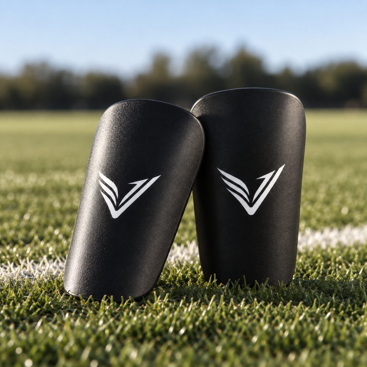 Pair of Stealth Guards standing on a football pitch